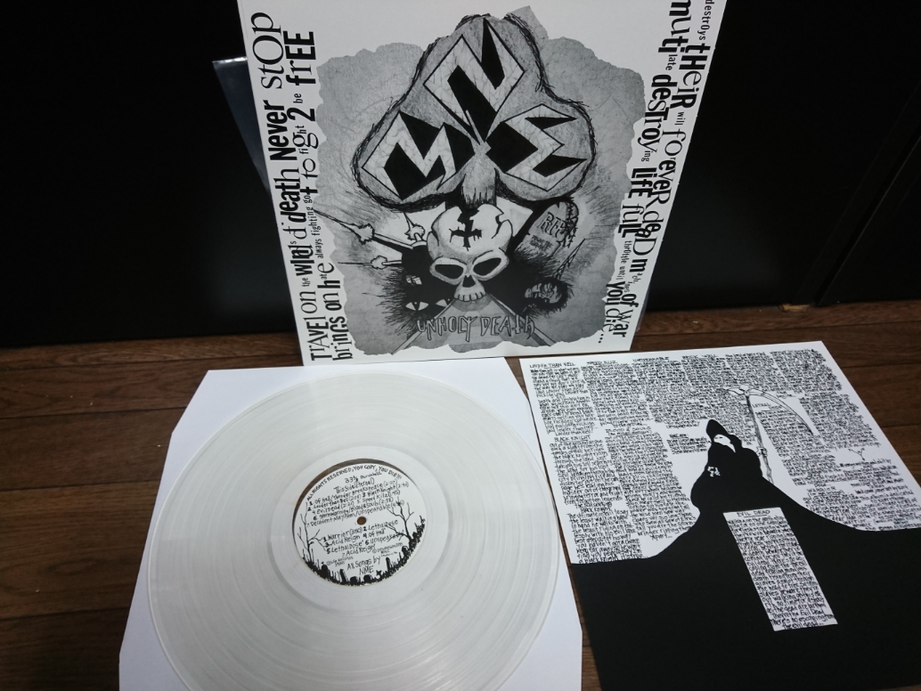 N.M.E. / Unholy Death (LP/Clear vinyl)